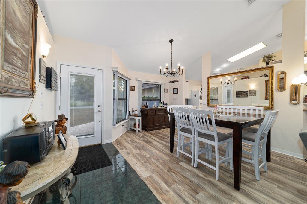 3 Fir Trail Ocala, FL 34472 - Photo 33 of 74 a view of a dining room with furniture