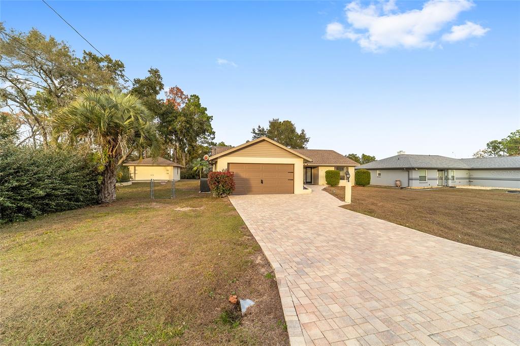 3 Fir Trail Ocala, FL 34472 - Photo 69 of 74 a view of house with outdoor space and sitting area