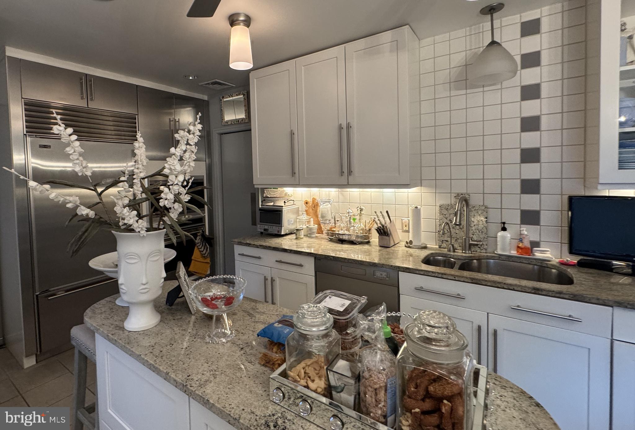 357 Sprague Road Penn Valley, PA 19072 - Photo 21 of 44 a kitchen with a sink and cabinets
