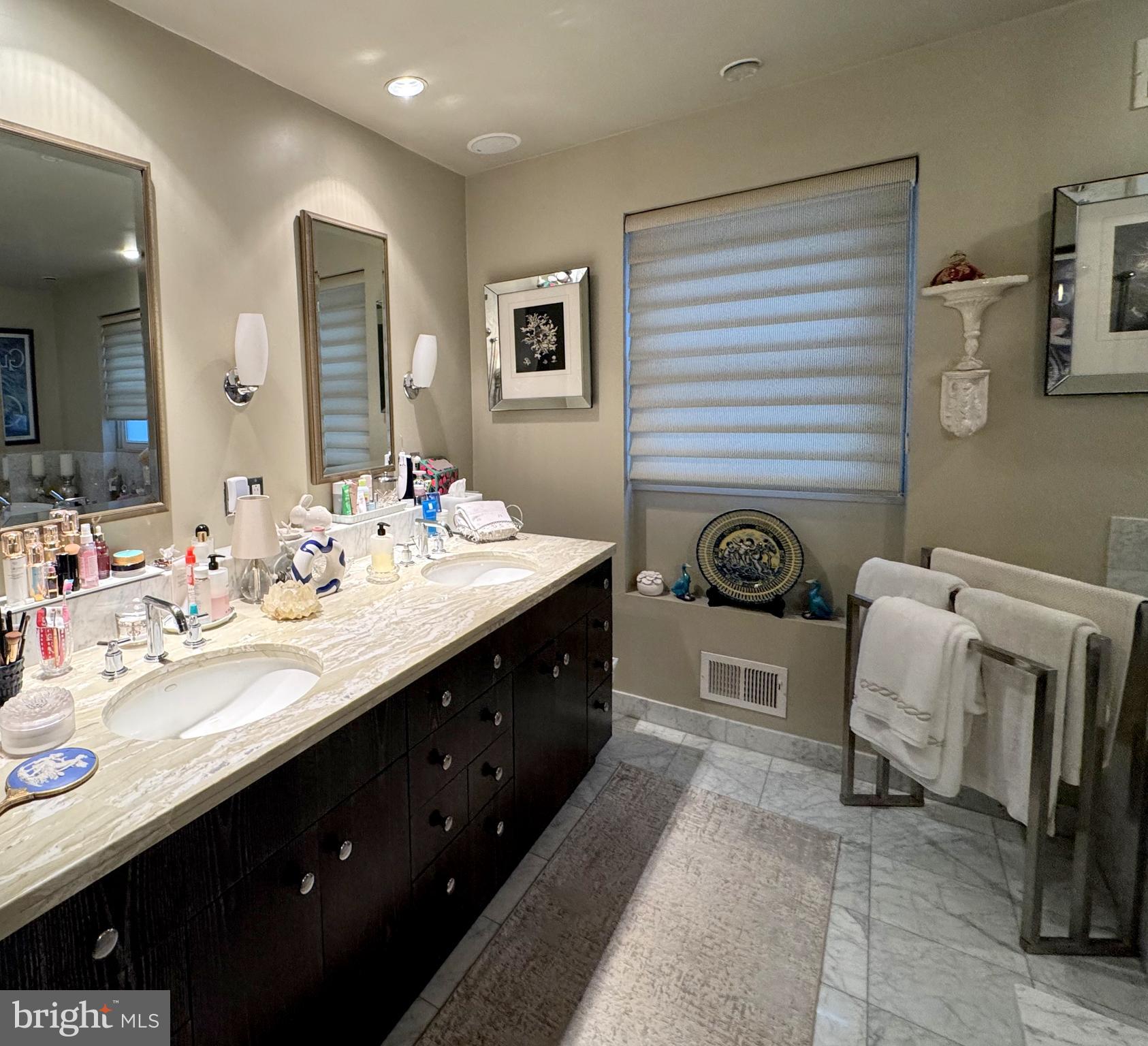 357 Sprague Road Penn Valley, PA 19072 - Photo 33 of 44 a spacious bathroom with a double vanity sink double and mirror