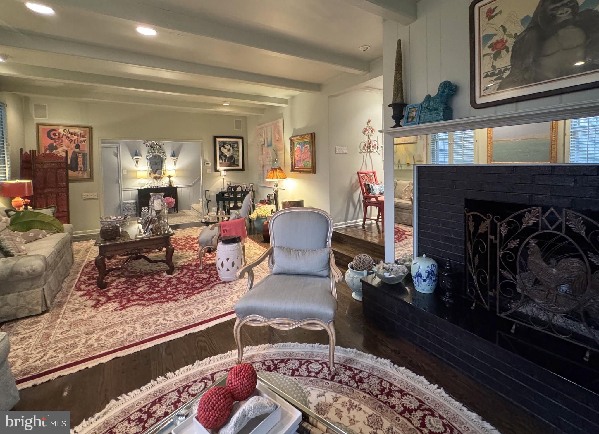 357 Sprague Road Penn Valley, PA 19072 - Photo 6 of 44 a living room with furniture and a fireplace