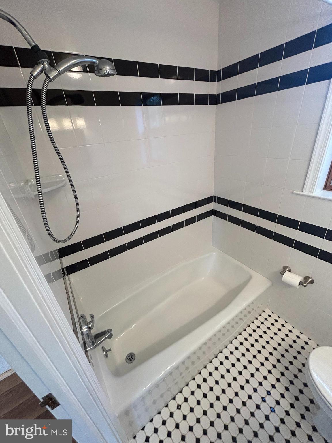 214 Grayling Avenue, Unit ONE Narberth, PA 19072 - Photo 11 of 22 a bathroom with a shower and a glass door