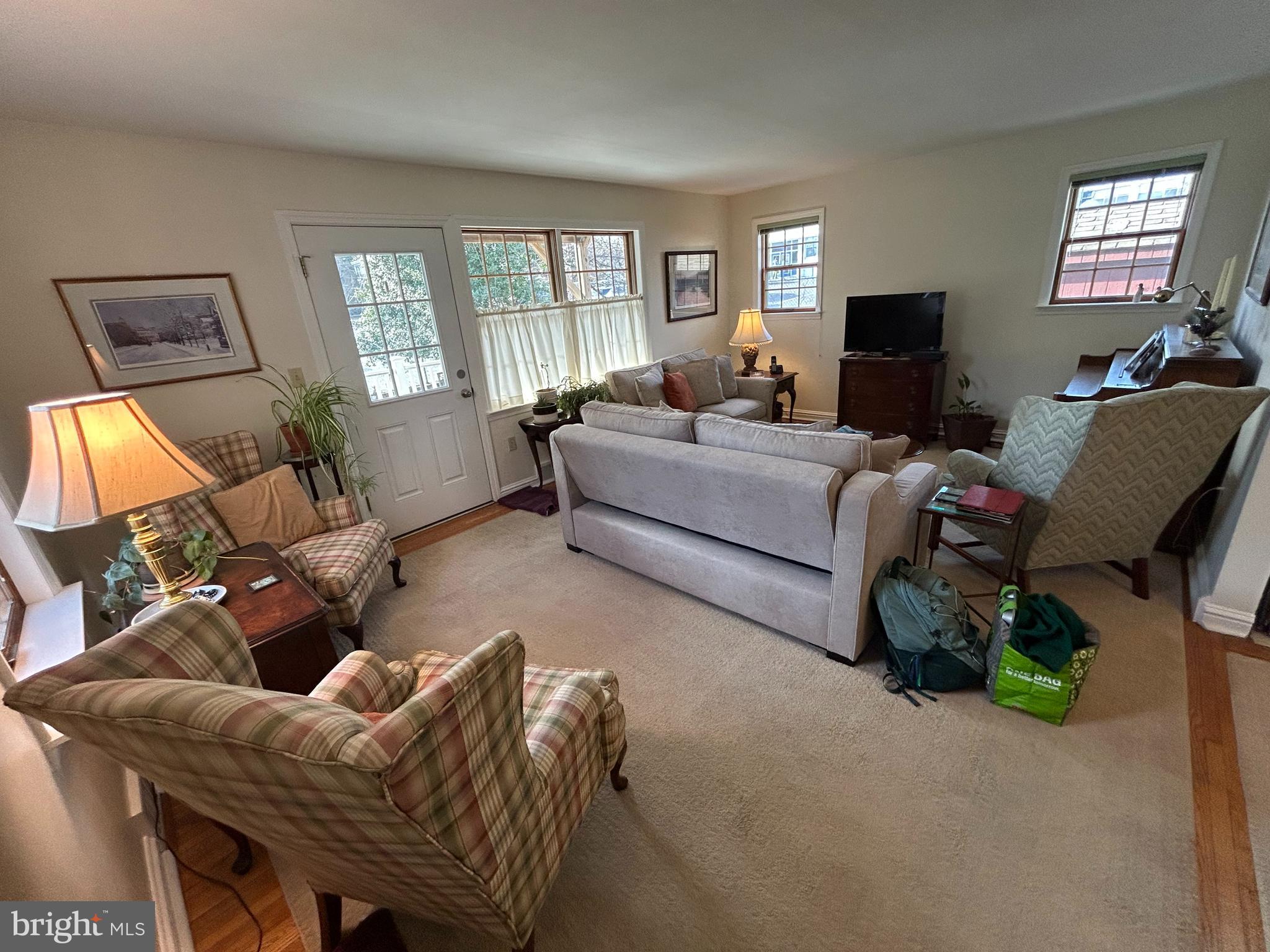 214 Grayling Avenue, Unit ONE Narberth, PA 19072 - Photo 2 of 22 a living room with furniture and a flat screen tv