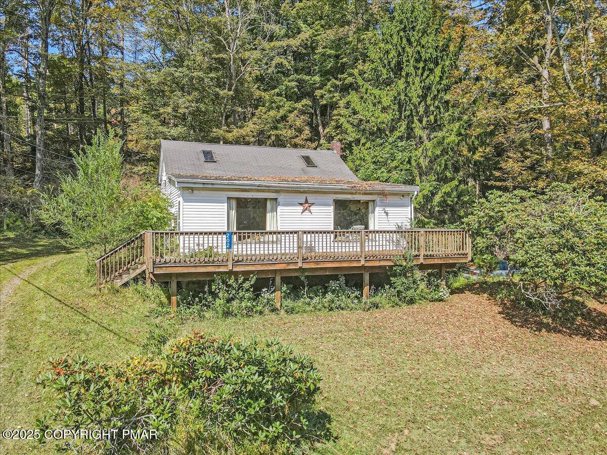 a house view with a garden space