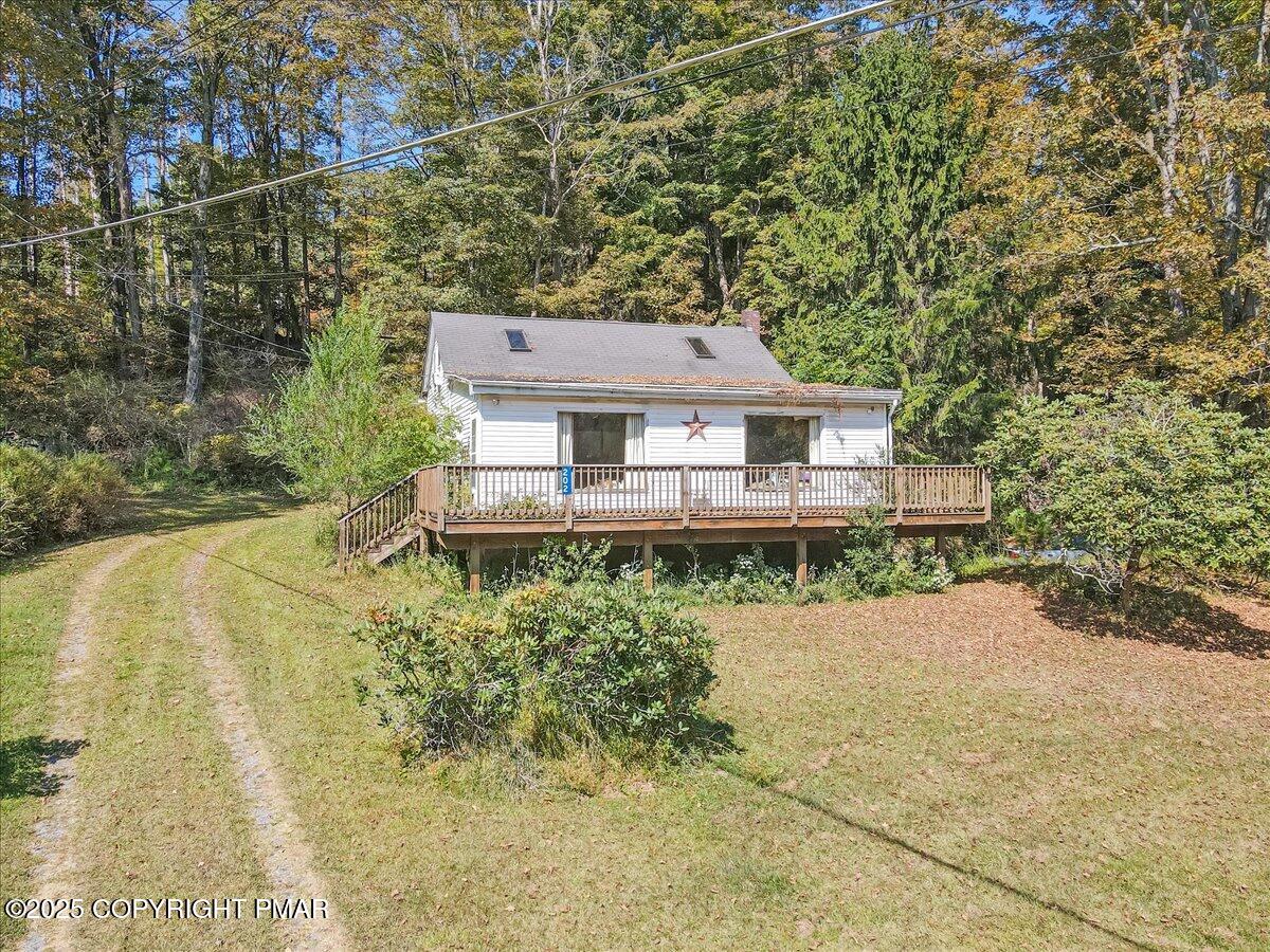 202 Price Road Stroudsburg, PA 18360 - Photo 2 of 45 a front view of a house with a yard