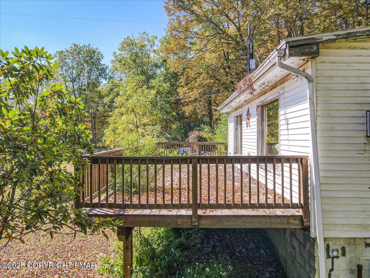 202 Price Road Stroudsburg, PA 18360 - Photo 21 of 45 a view of a chair with wooden fence