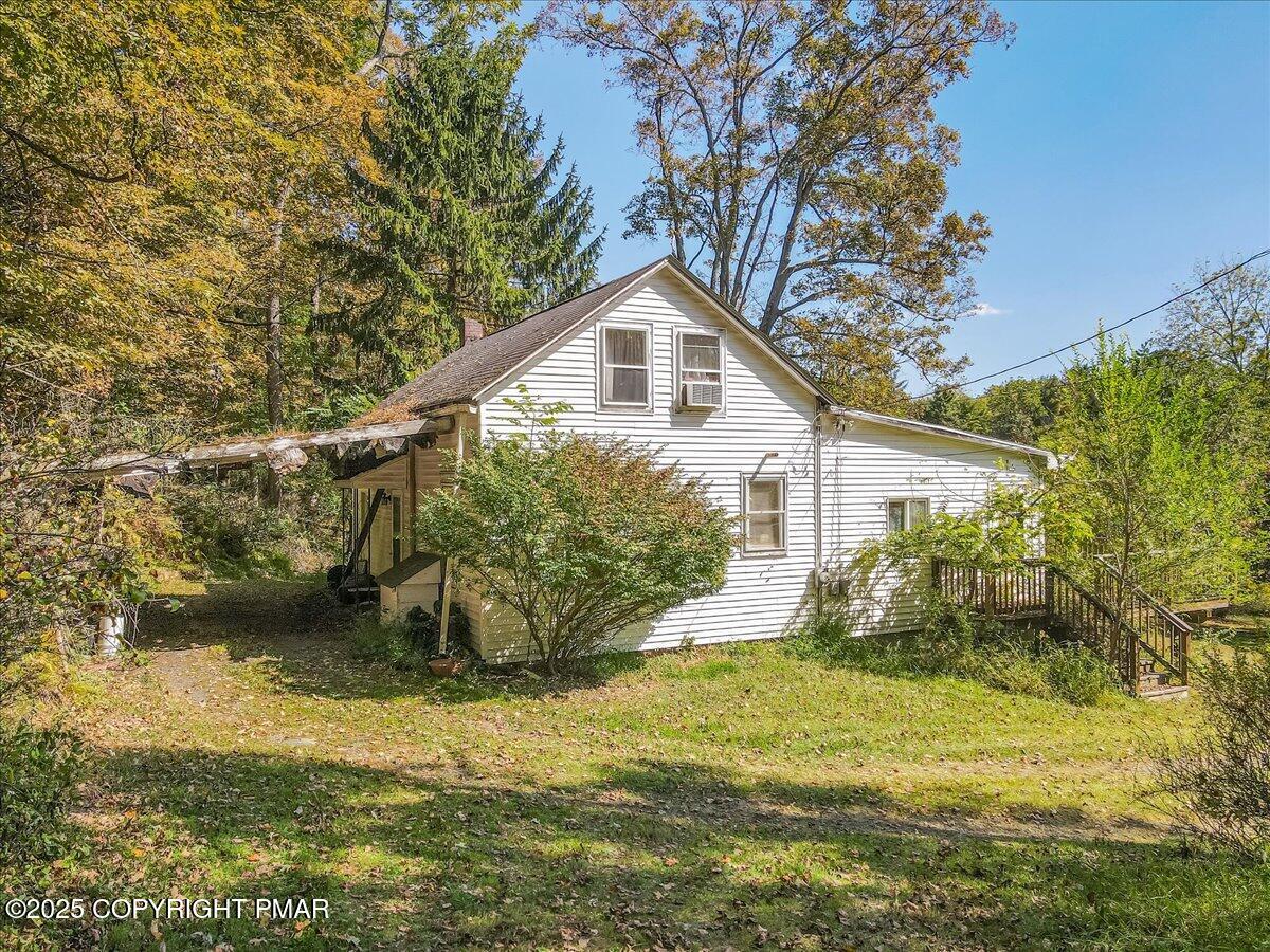 202 Price Road Stroudsburg, PA 18360 - Photo 24 of 45 a view of a house with a yard