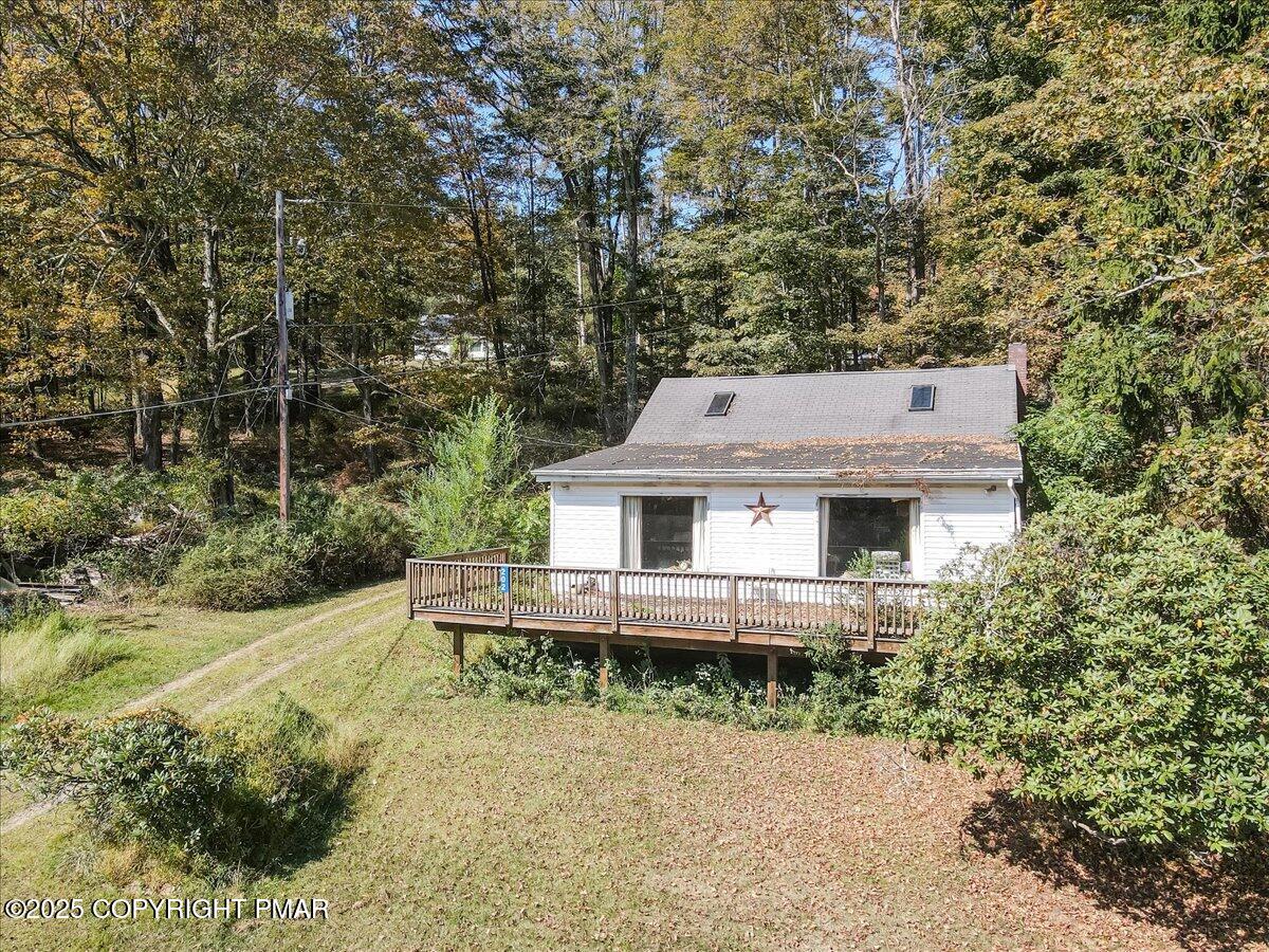 202 Price Road Stroudsburg, PA 18360 - Photo 29 of 45 front view of a house with a yard