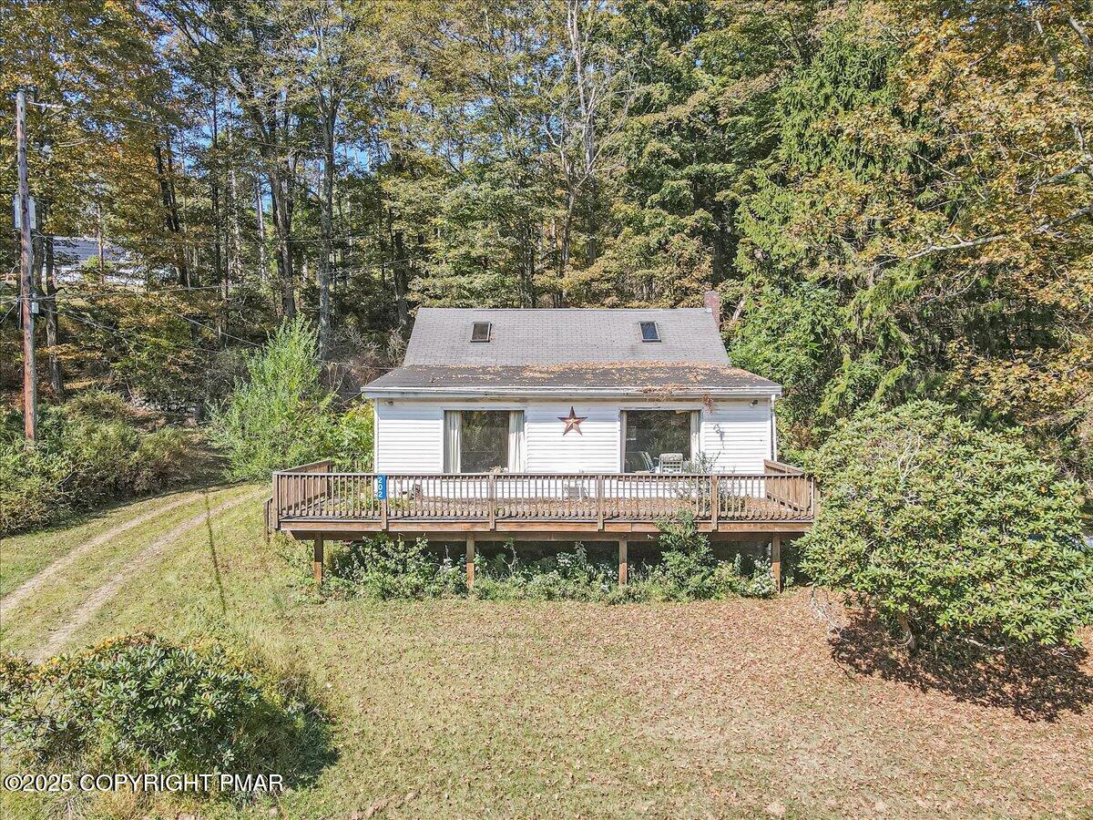 202 Price Road Stroudsburg, PA 18360 - Photo 4 of 45 front view of a house with a yard