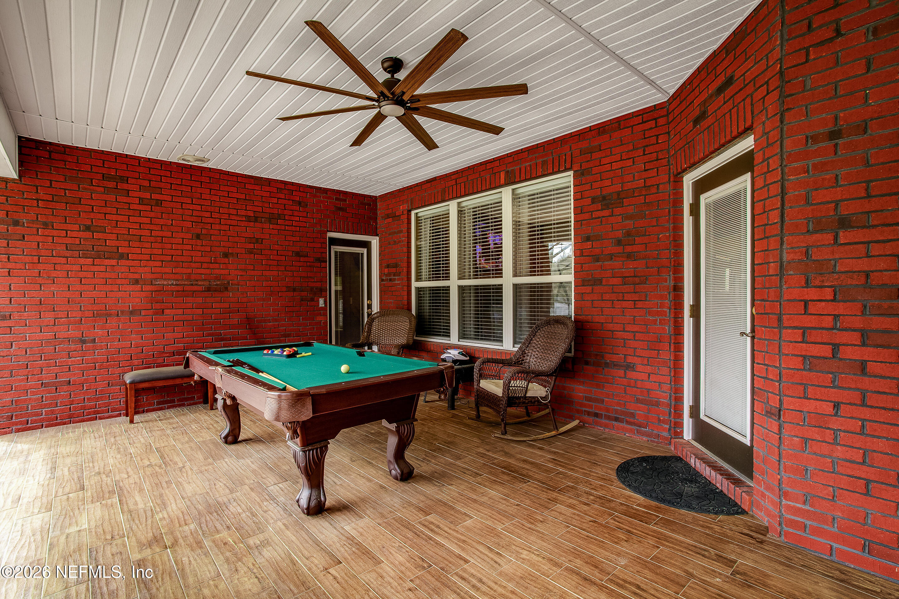 3795 Raintree Drive Macclenny, FL 32063 - Photo 18 of 40 a backyard of a house with seating space