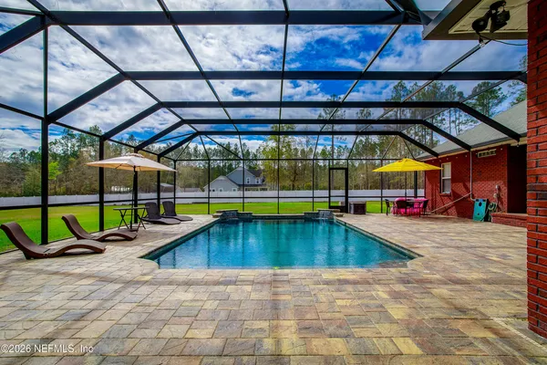 a swimming pool with a yard