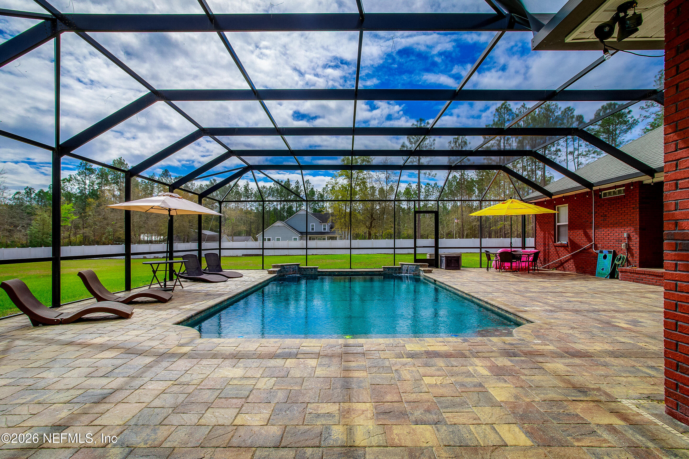 3795 Raintree Drive Macclenny, FL 32063 - Photo 24 of 40 a swimming pool with a yard