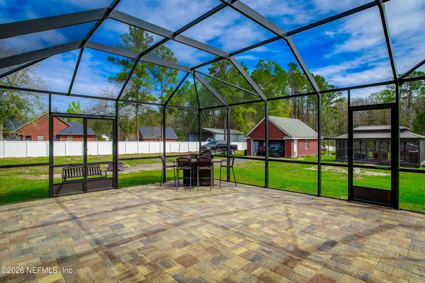 a view of yard with sitting area
