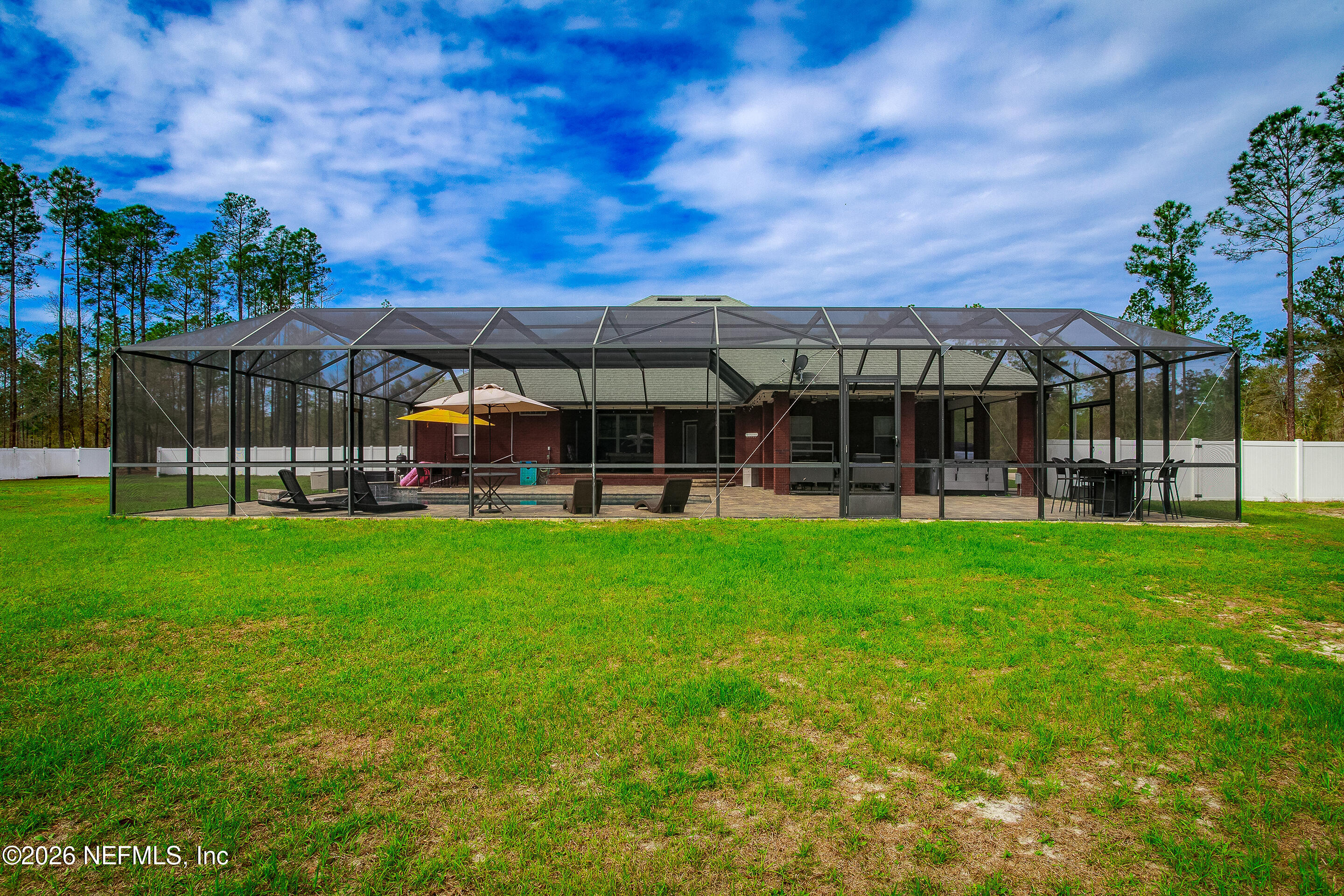 3795 Raintree Drive Macclenny, FL 32063 - Photo 26 of 40 a view of a house with a backyard