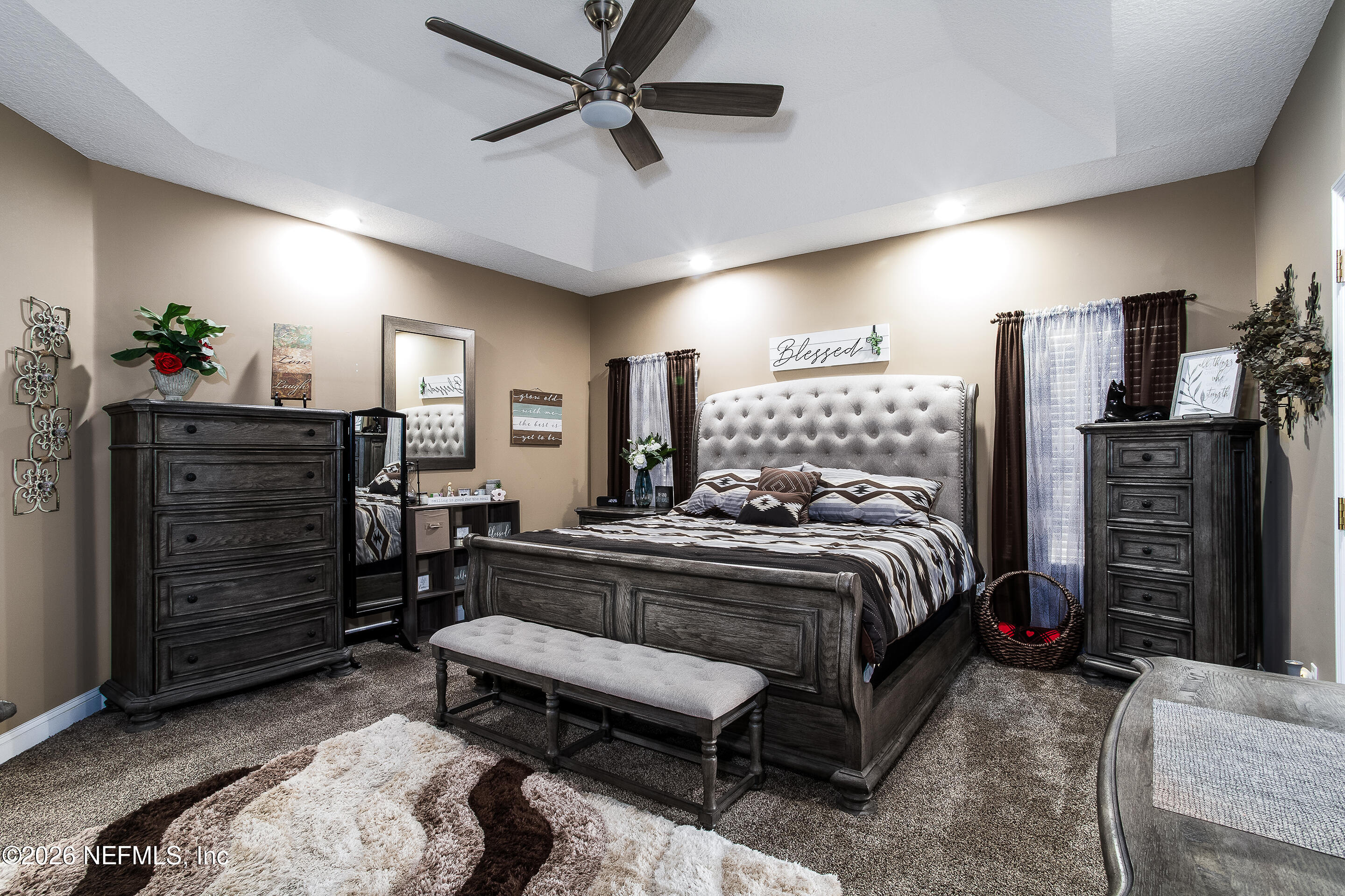 3795 Raintree Drive Macclenny, FL 32063 - Photo 8 of 40 a bed room with a bed window and a television