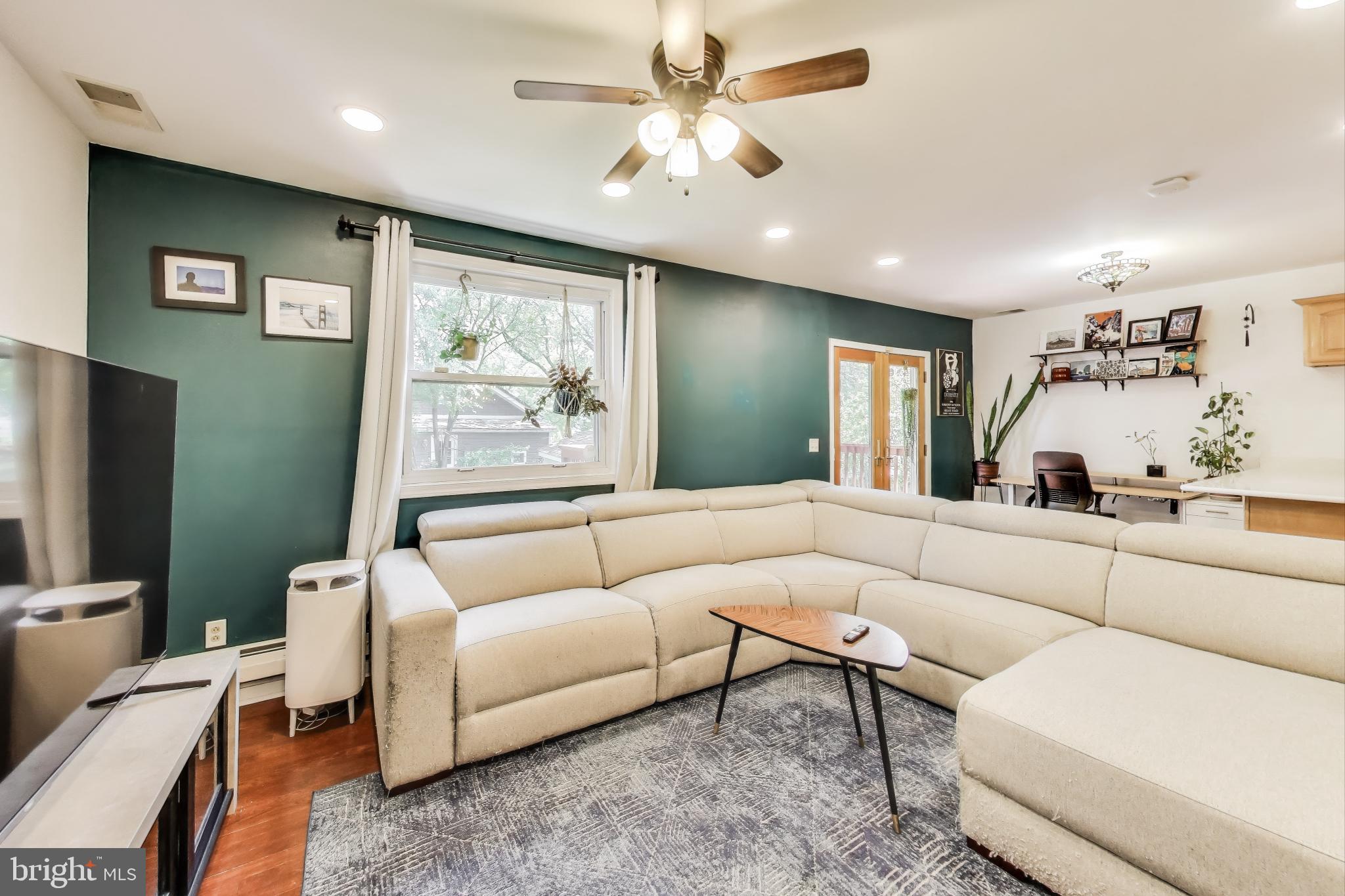 805 Islington Street Silver Spring, MD 20910 - Photo 17 of 50 a living room with furniture and a large window