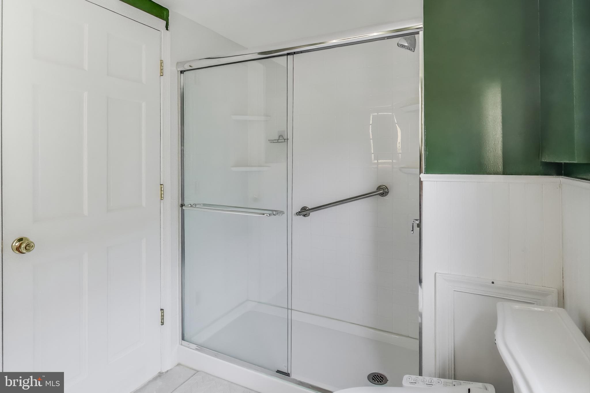 805 Islington Street Silver Spring, MD 20910 - Photo 27 of 50 a bathroom with a shower and a toilet