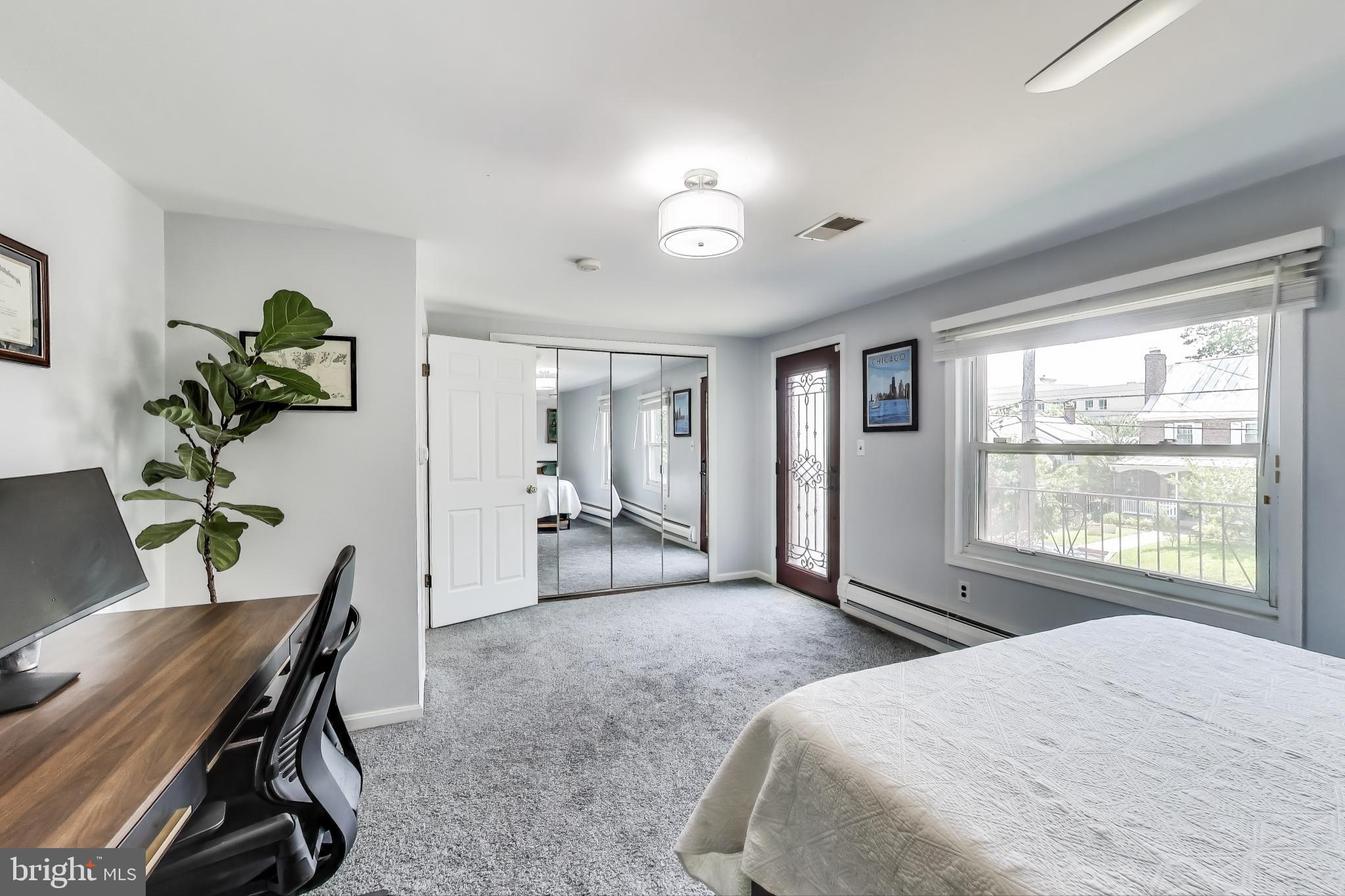 805 Islington Street Silver Spring, MD 20910 - Photo 29 of 50 a bedroom with a bed and a window