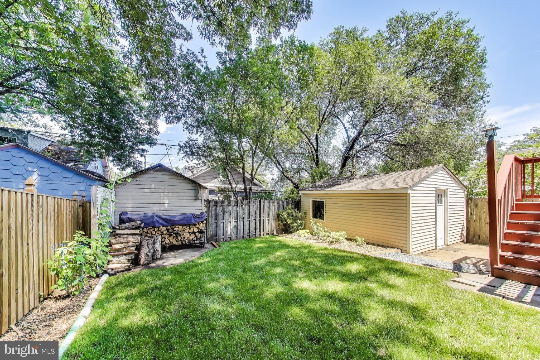 805 Islington Street Silver Spring, MD 20910 - Photo 45 of 50 a front view of house with yard and seating area