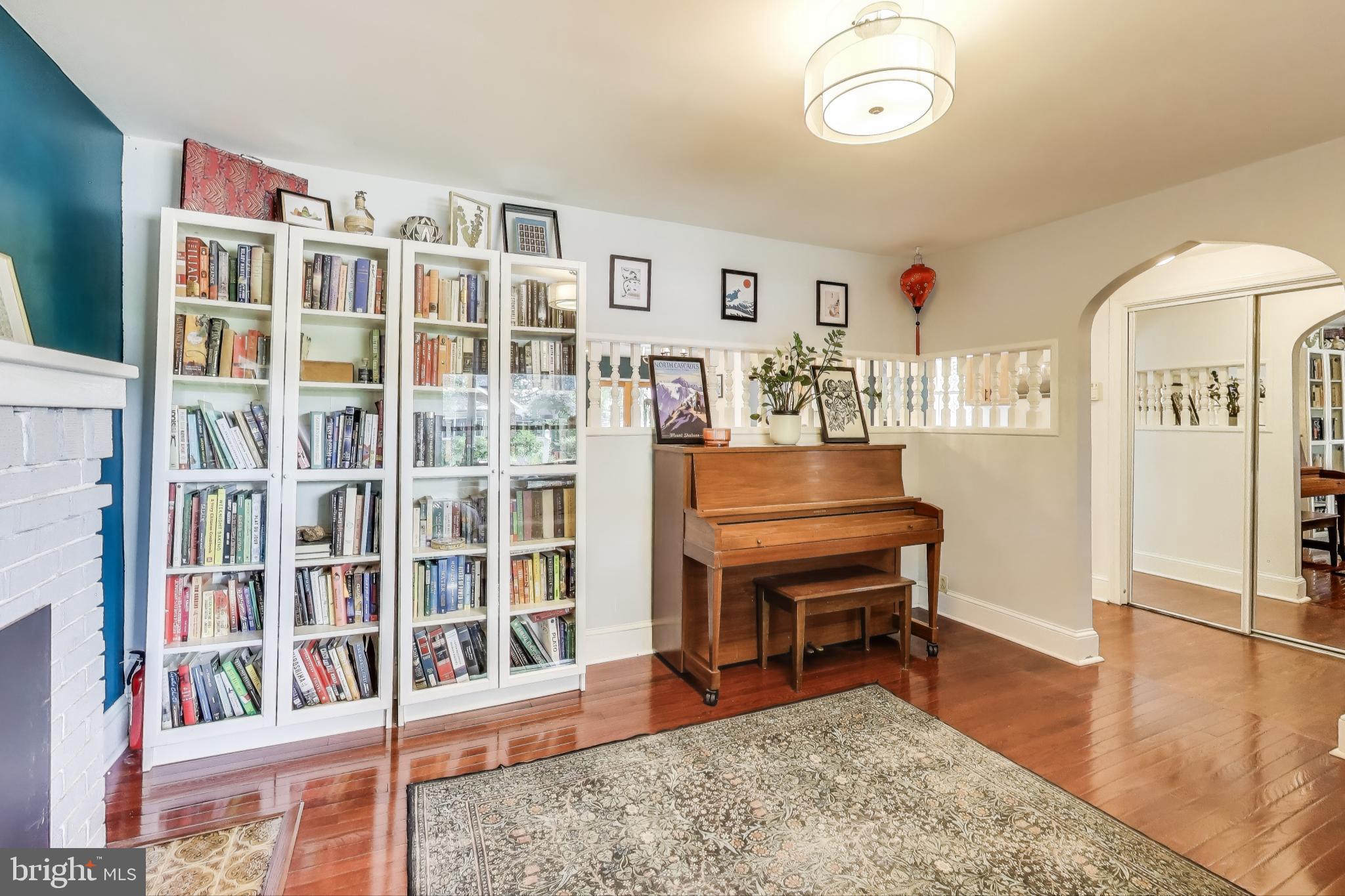 805 Islington Street Silver Spring, MD 20910 - Photo 9 of 50 a living room with furniture and a dining table