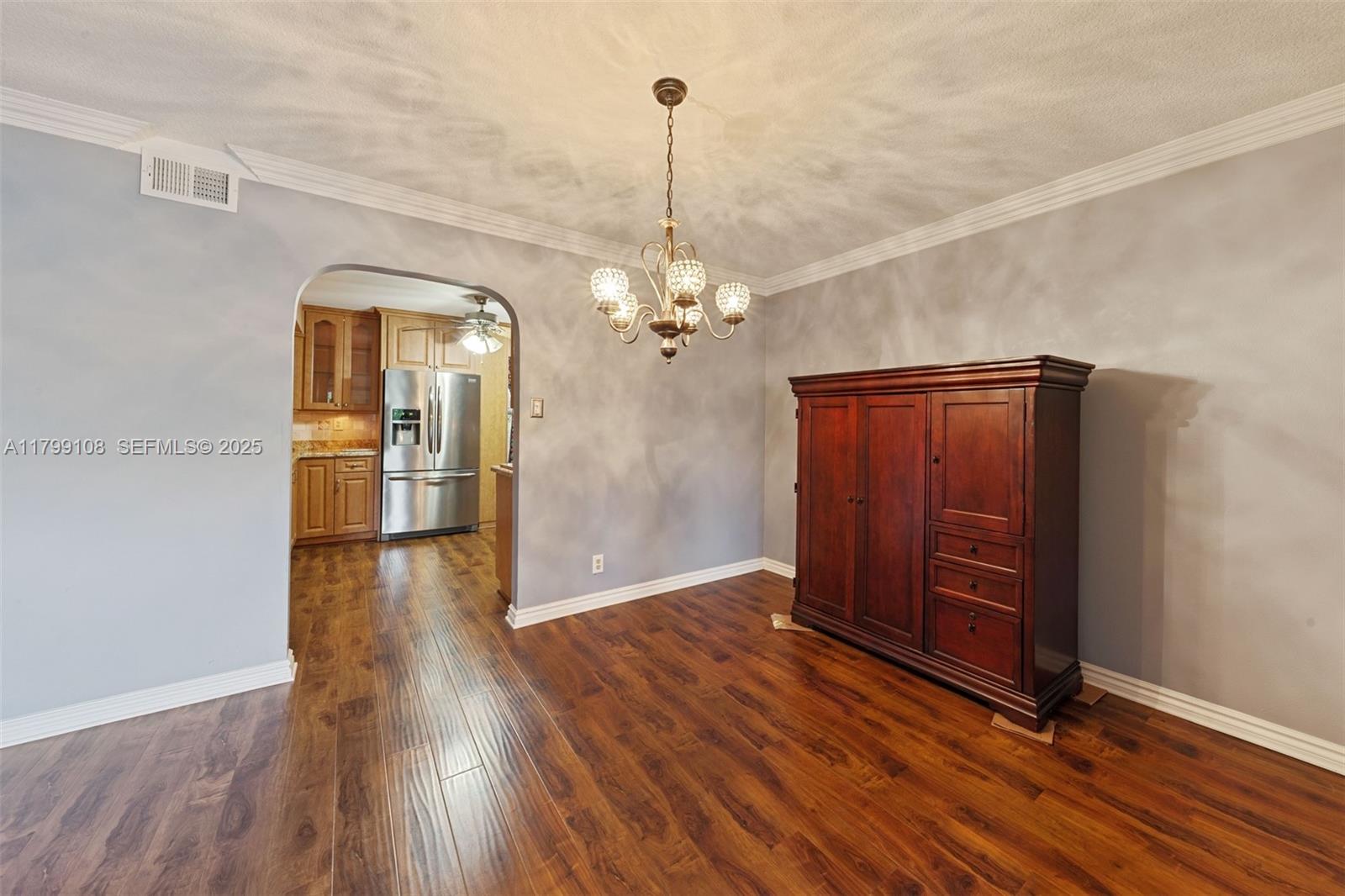 6668 Burning Wood Drive, Unit 166 Boca Raton, FL 33433 - Photo 7 of 27 a view of a room with wooden floor staircase and a hallway