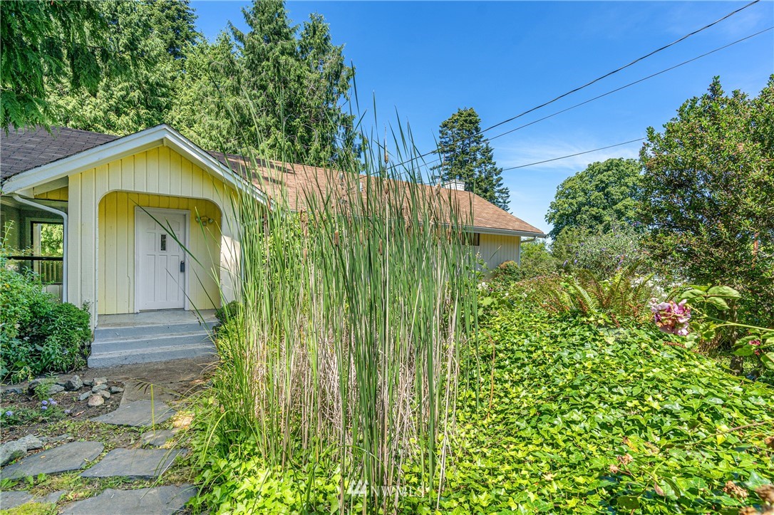 929 Blackburn Road Camano Island, WA 98282 - Photo 3 of 39 a view of a house with a small yard