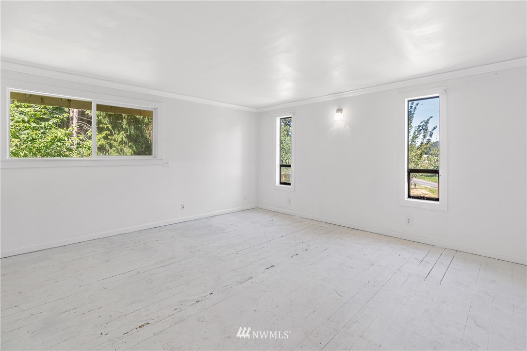 929 Blackburn Road Camano Island, WA 98282 - Photo 26 of 39 an empty room with windows