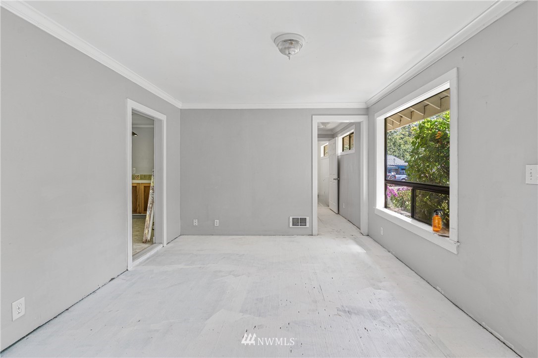 929 Blackburn Road Camano Island, WA 98282 - Photo 27 of 39 a view of an empty room with a window