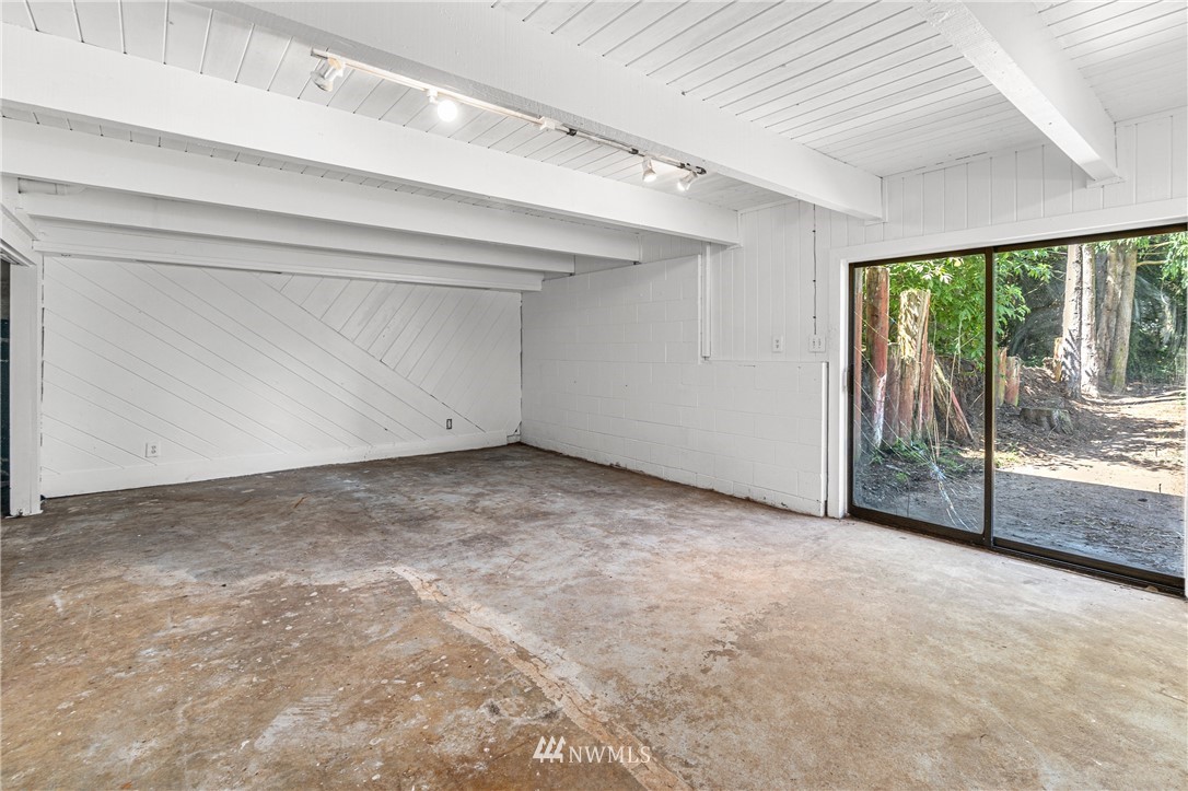 929 Blackburn Road Camano Island, WA 98282 - Photo 31 of 39 a view of an empty room with a balcony