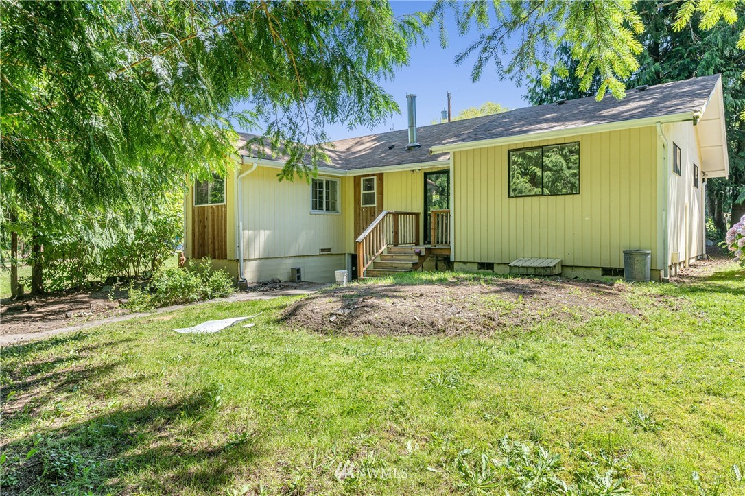 929 Blackburn Road Camano Island, WA 98282 - Photo 36 of 39 a front view of a house with garden