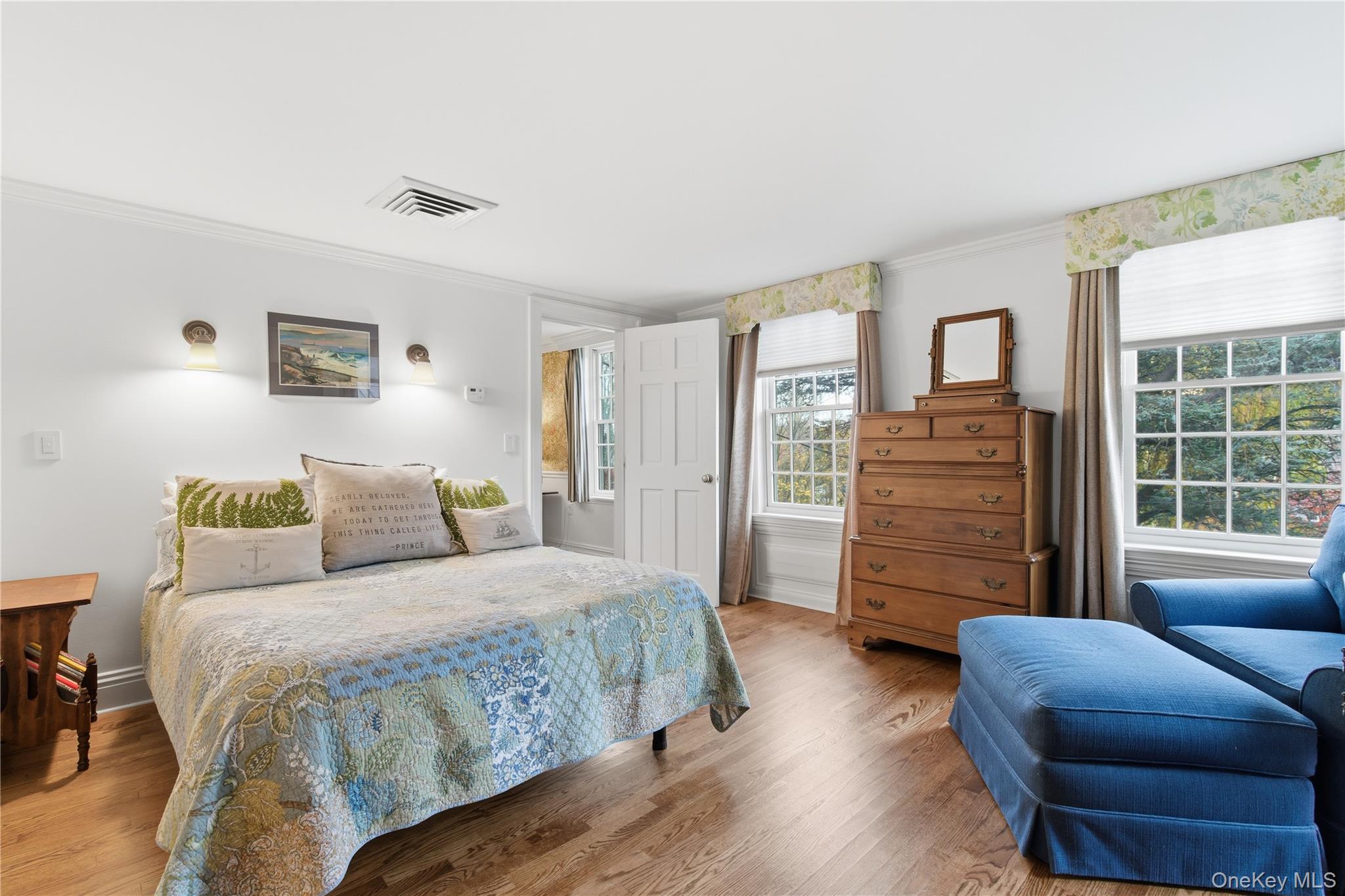 144 West Neck Road Huntington, NY 11743 - Photo 16 of 33 a bedroom with a bed and a couch