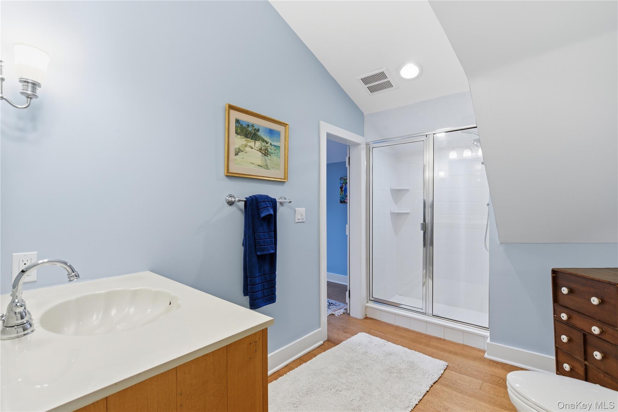 144 West Neck Road Huntington, NY 11743 - Photo 22 of 33 a bathroom with a sink and a mirror