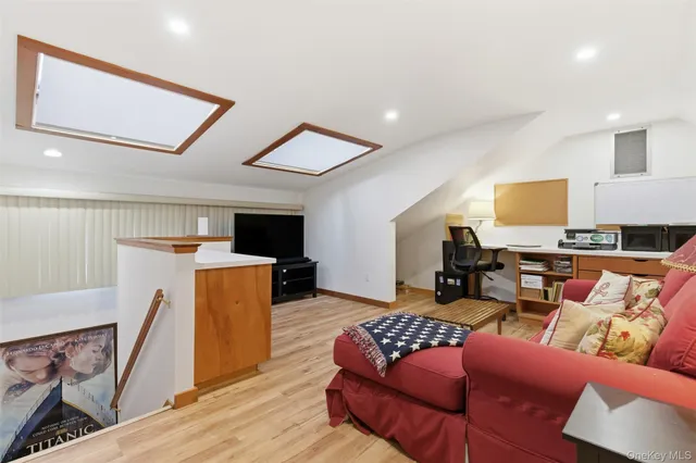 a group of people sitting in front of a building