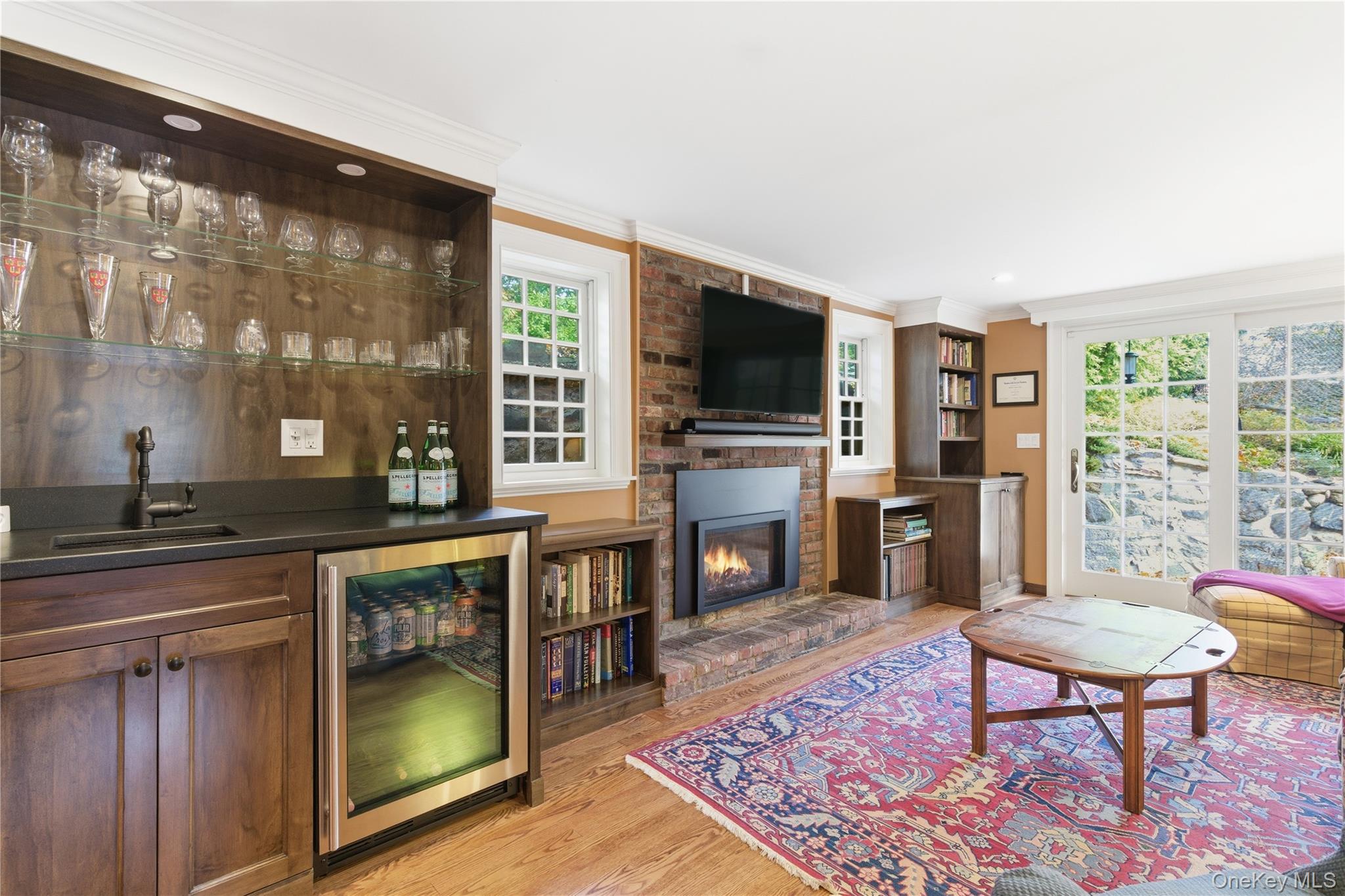 144 West Neck Road Huntington, NY 11743 - Photo 7 of 33 a living room with furniture a flat screen tv and a fireplace