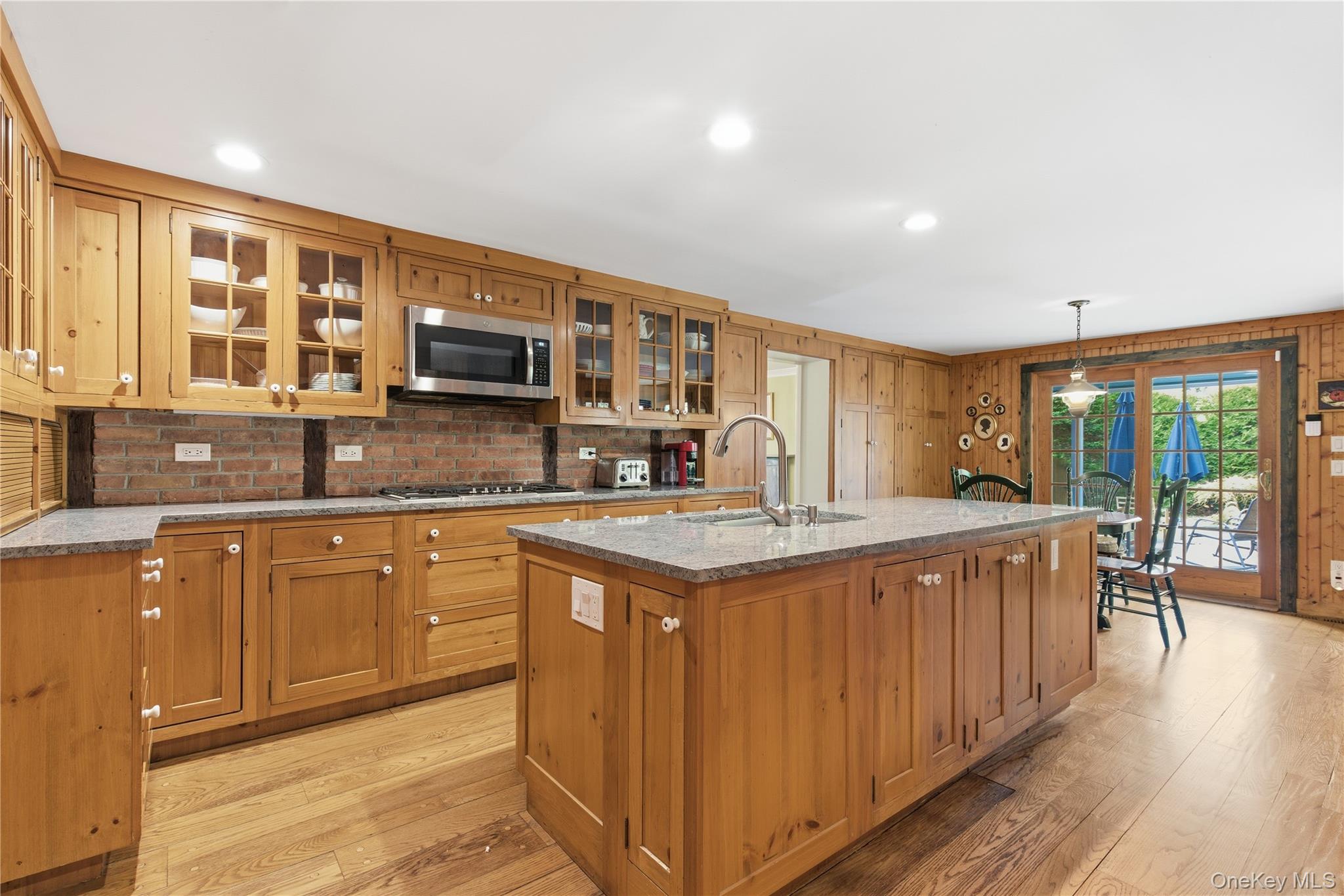 144 West Neck Road Huntington, NY 11743 - Photo 9 of 33 a kitchen with stainless steel appliances granite countertop a sink stove and cabinets
