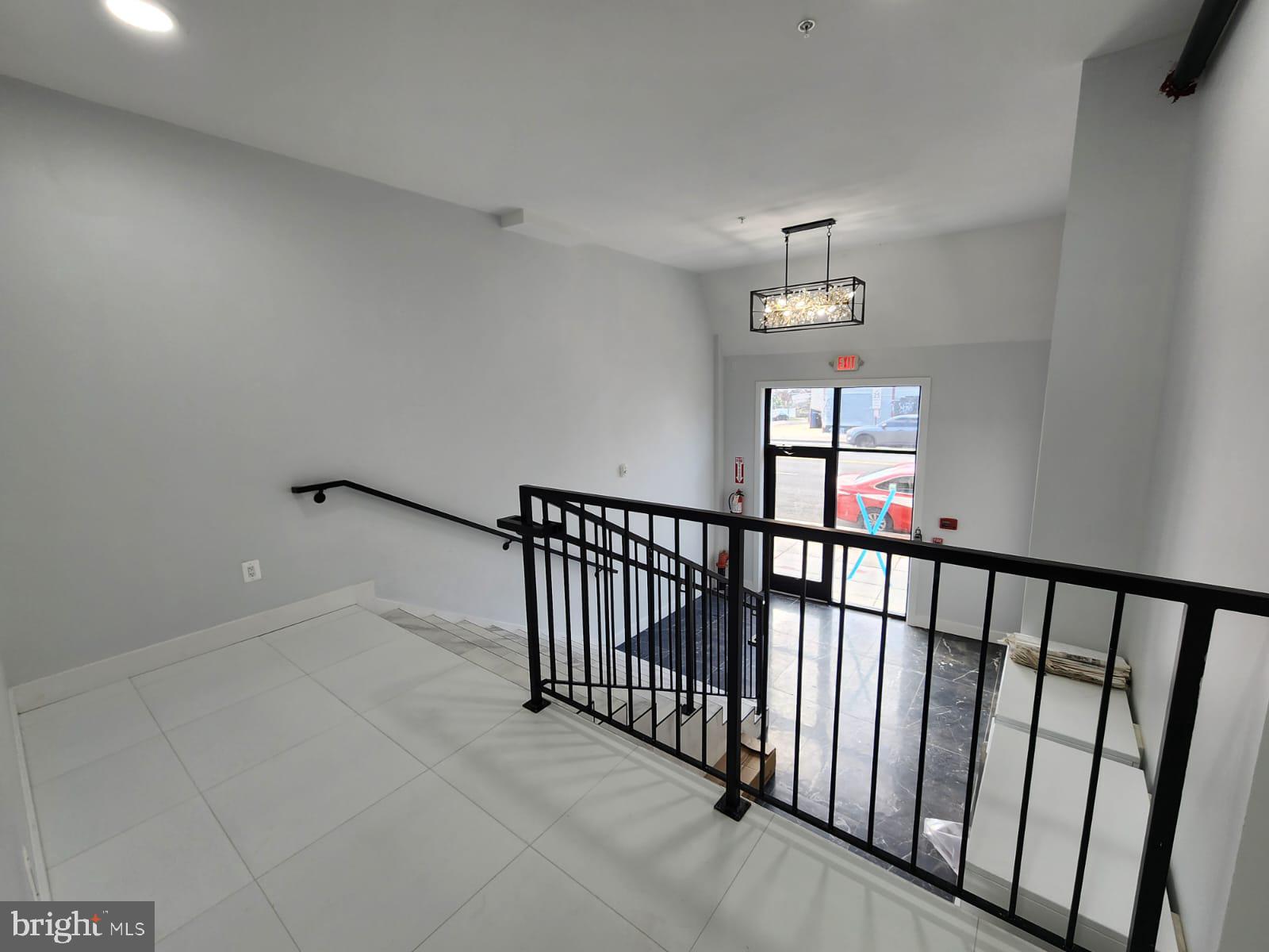 4905 Georgia Avenue Northwest, Unit 105 Washington, DC 20011 - Photo 17 of 18 a view of entryway with stairs