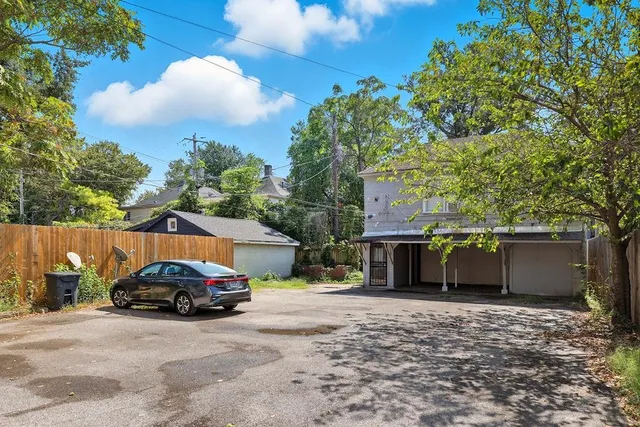 a car parked in front of a house