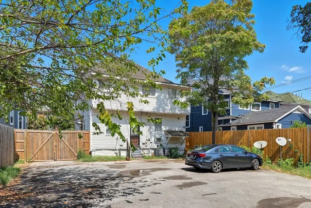 a car parked in front of a building