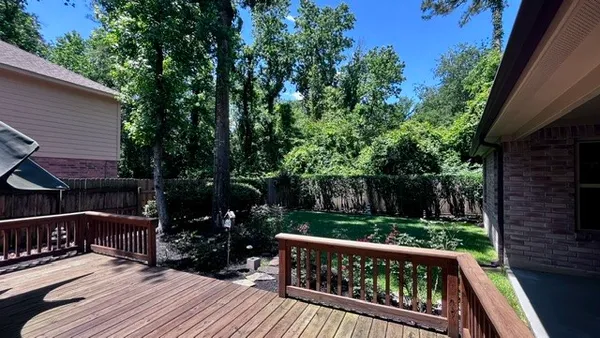 $543,000 | 103 Breezy Point Place, The Woodlands, TX 77381