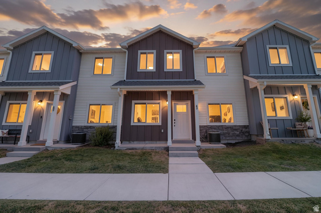 46 West 460 Smithfield, UT 84335 - Photo 1 of 31 Contemporary townhome exterior featuring a two-story design with varied siding textures