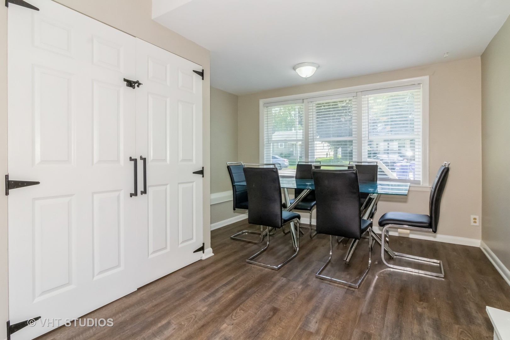 903 North 13th Street DeKalb, IL 60115 - Photo 12 of 19 a view of a workspace with furniture and a window
