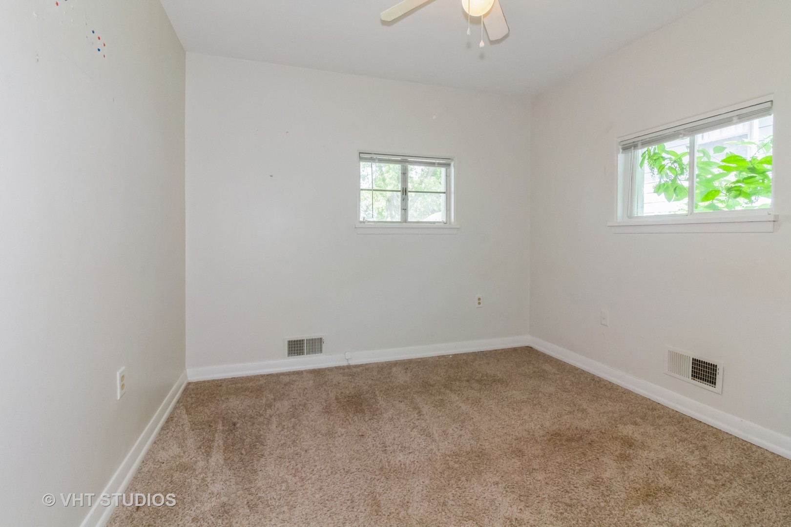903 North 13th Street DeKalb, IL 60115 - Photo 15 of 19 an empty room with a window