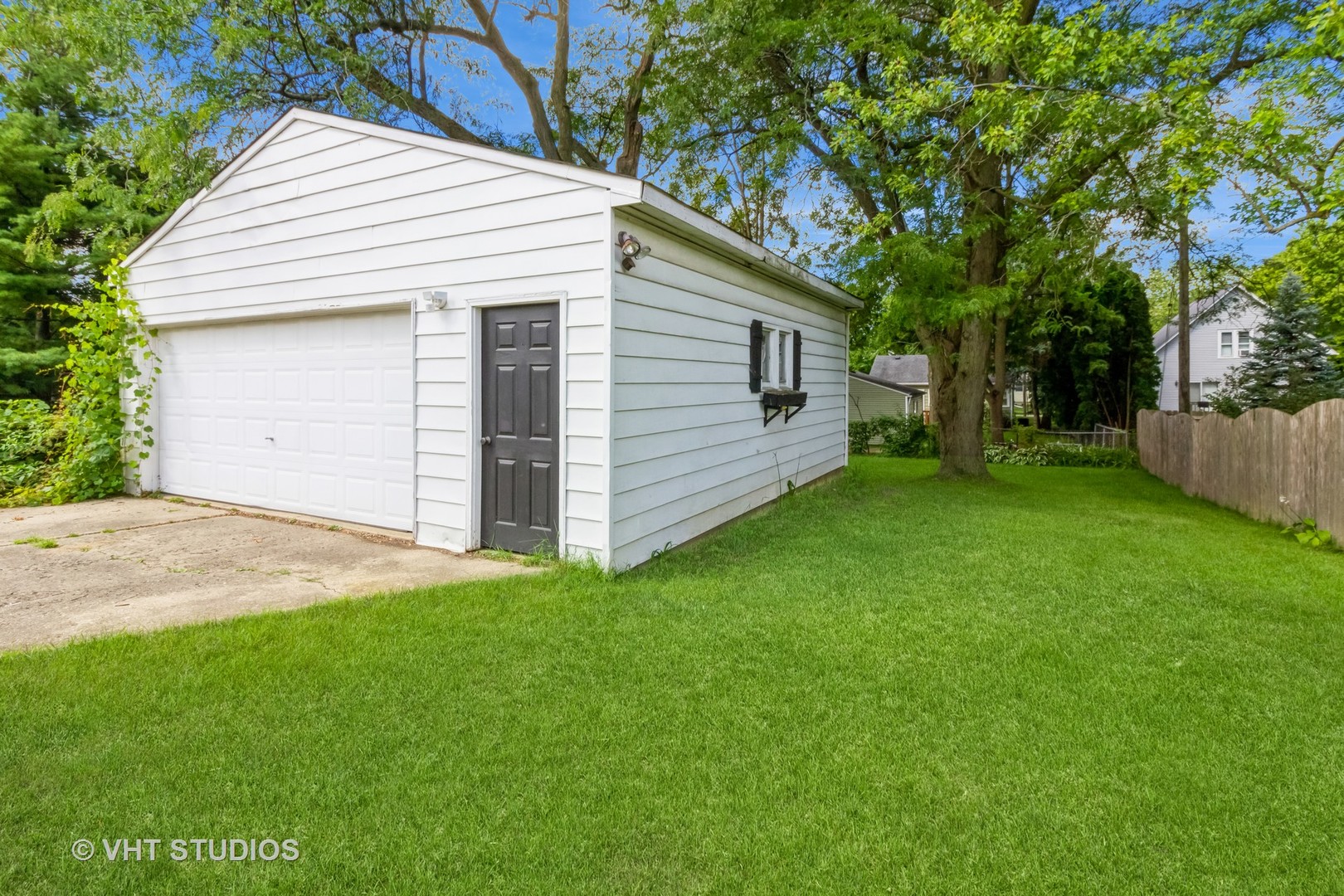 903 North 13th Street DeKalb, IL 60115 - Photo 18 of 19 front view of a house with a yard