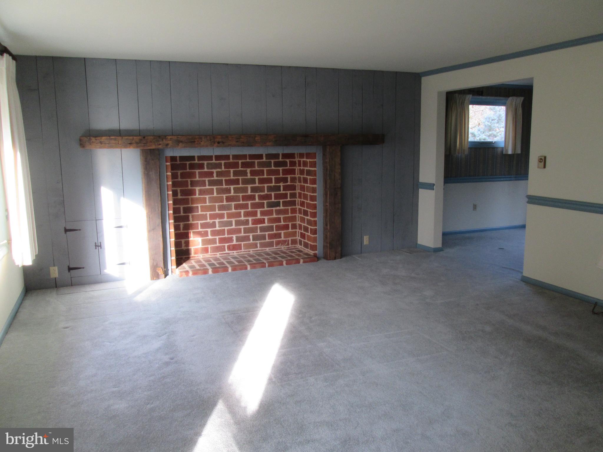 3 Neil Drive Lititz, PA 17543 - Photo 10 of 41 Living Room with Crown Molding & Chair Rail