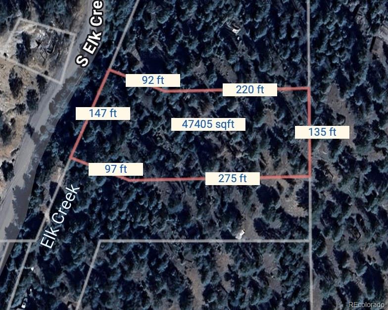 0 South Elk Creek Road Pine, CO 80470 - Photo 7 of 8 a bathroom with a glass door