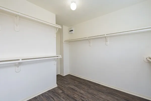 a view of an empty walk in closet