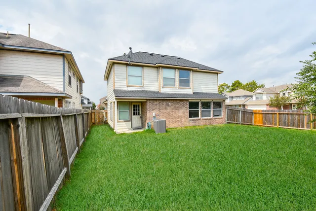 a front view of house with yard and seating area