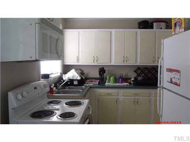 629 Coleman Street Raleigh, NC 27610 - Photo 6 of 25 NEWER APPLAINES, NICE CABINETS, NEWER MICROWAVCE AND NEW COUNTER TOPS! Kitchen