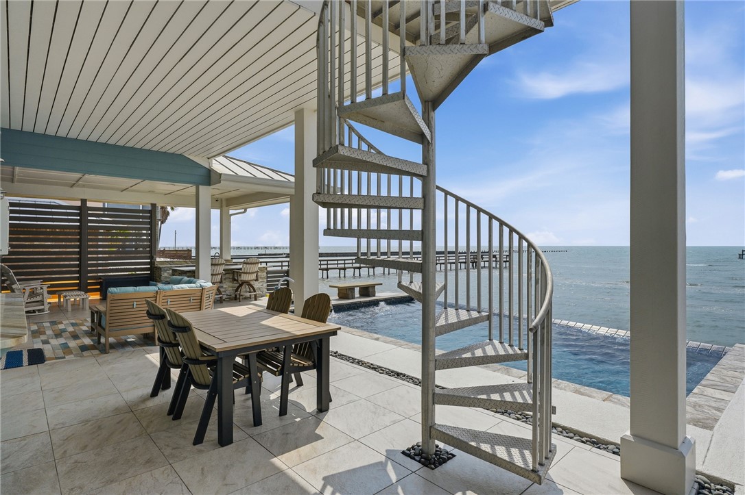 12 Sea Shell Shores Rockport, TX 78382 - Photo 28 of 40 a view of a dining room a table and chairs