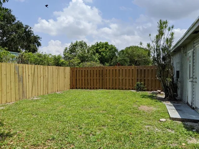 a view of a backyard with of the house